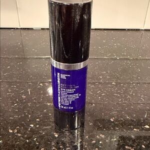 Peter Thomas Roth Purple and Black Eye Cream Pump Bottle
